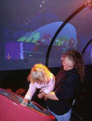 The curved cartoon screen in the Pattern Pod  Science Museum  London 2000.