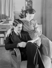 Couple reading  c 1949.