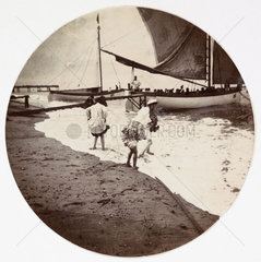 Children paddling in the sea  c 1890.