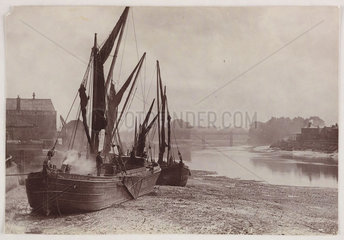Beached barges  c 1890.