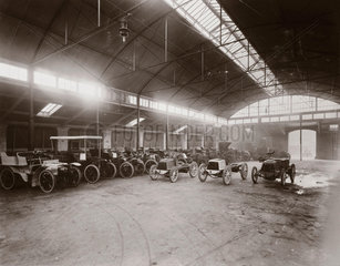 Motor cars parked inside Lillie Hall  Fulham  London  1902.