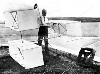 Lawrence Hargrave with his triple-box kite arrangement  1898.
