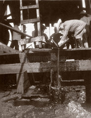 Drilling for oil aboard the 'Lucas'  Mexico  1905.