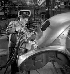 Rivetting a car body  Brixton  1951.