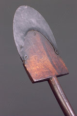 Metal-reinforced wooden spade  19th century.