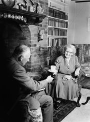 Elderly couple drinking tea  1956.