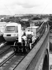 ‘Rocket’ replica and modern train  c 1980s.