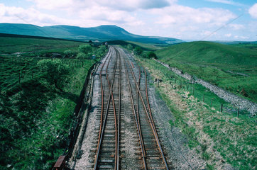Two railway lines dividing into four  with