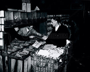 Sorting out Christmas air mail for the British Empire  30 November 1938.