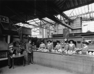 Women volunteers running the free buffet at Paddington station  c 1914.