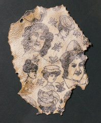 Human skin tattooed of women's heads and butterflies  French  1900-1920.