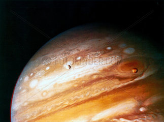 The planet Jupiter  showing two of its moons and the Great Red Spot  1979.