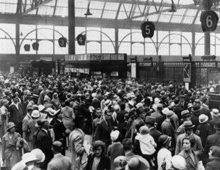 Crowds at Waterloo Station  London  5 August 1933.
