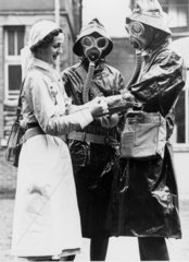 Nurses in decontamination dress  24 October 1939.