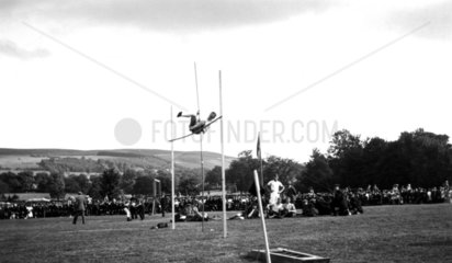 Pole-vaulter in action  c 1930s.