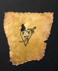 Human skin tattooed with pierced heart and inscription  French  19th century.
