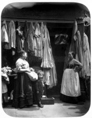 'An Old Clothes Shop  Seven Dials'  Covent Garden  London  1877.