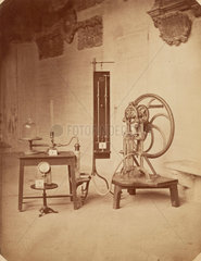 Delenil’s Reciprocating Vacuum Punch and two manometers  1876.
