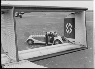Mercedes-Benz convertible  and swastika on Junkers tailplane  1930s.