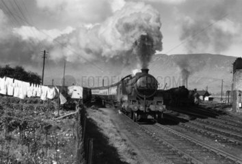 'McCailin Mor' steam locomotive dirtying laundry  Scotlan  1952.