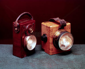 Electric battery-powered Swan safety lamps  British  early 20th century.