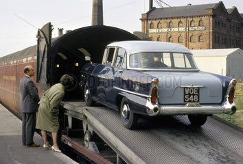 Car being loaded on train  1962.