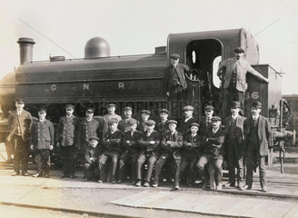 Doncaster works staff beside a tank engine  South Yorkshire  c 1916.