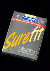 Packet of two Durex Surefit condoms  1995.