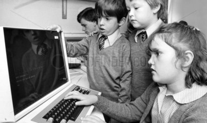 Children using a computer  Liverpool  1982.