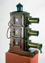 Triunial magic lantern with three lenses  1890.