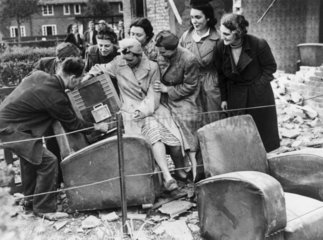 'They salvaged a wireless set from their ruined home’  15 September 1940.
