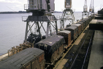 Train of containers on quay  Rotterdam  Netherlands  July 1962.