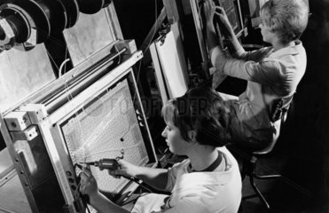 Female workers at English Electric assemble circuits  1967.