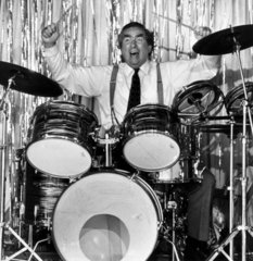 Dennis Healey playing the drums  June 1983.