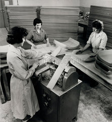 Three female workers make car seats from polystyrene  1963.