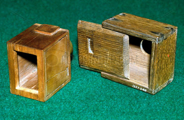 Two of W H F Talbot’s experimental ‘mousetrap’ cameras  c 1835.