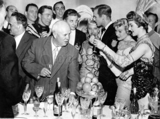 Khrushchev drinking with American show-girls  1959.