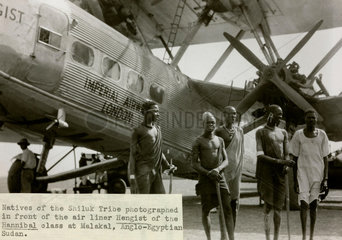 HP42 G-AAXE 'Hengist' with natives of the Shiluk tribe  Sudan  c 1930s.