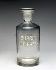 Clear glass reagent bottle labelled ‘CUPRIC SULPHATE’  1930.
