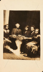 A seance  c 1920.