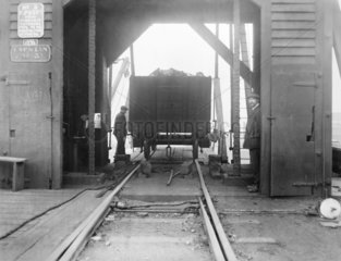Wagon loaded with coal in a shed at Garston docks  Liverpool  c 1926.