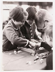 Children using Cuisenaire maths education rods  1962.