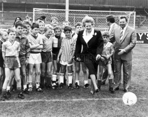 Margaret Thatcher kicking a football  Scunthorpe  September 1988.