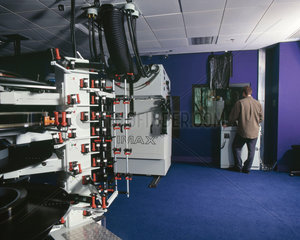 A technician in the Imax projection room  Wellcome Wing  2000.