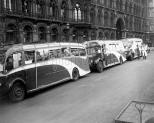 Motor coaches starting a tour  1950. Touris