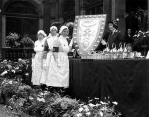 The Duchess of York presenting a shield to Liverpool Nurses  15 May 1931.