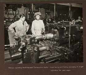 'Woman operating No.9 Herbert Combination Lathe...'  1915-1918.