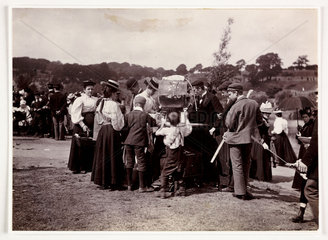 Drinks fountain at a fair  c 1898.