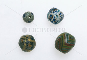 Four eye-beads  c 1300 BC.