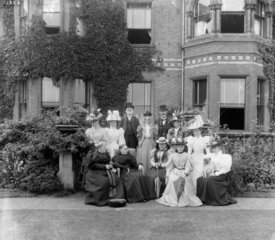 Tom G Clayton and S W Johnson with relatives  1899.